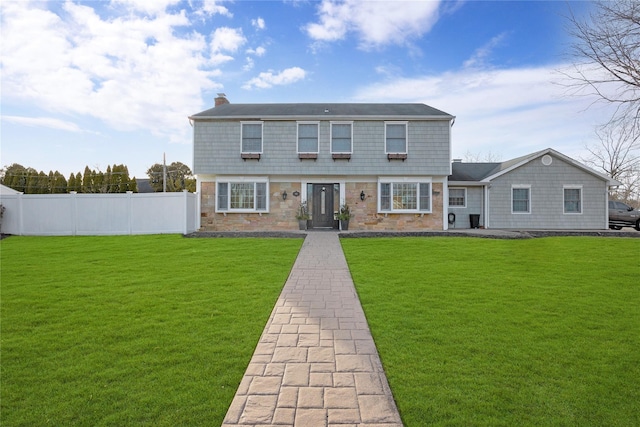 view of front of house with a front lawn