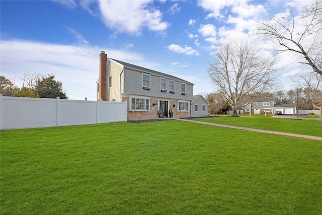 view of front facade with a front lawn