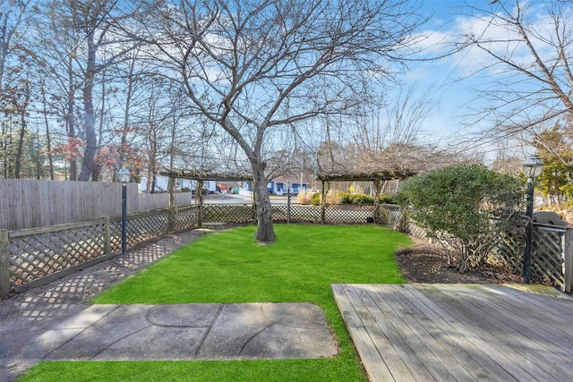 view of yard with a deck