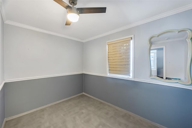 unfurnished room with carpet floors, ornamental molding, and ceiling fan