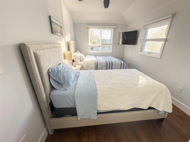 bedroom featuring dark hardwood / wood-style flooring