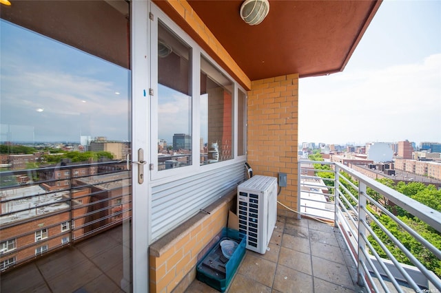 balcony featuring ac unit