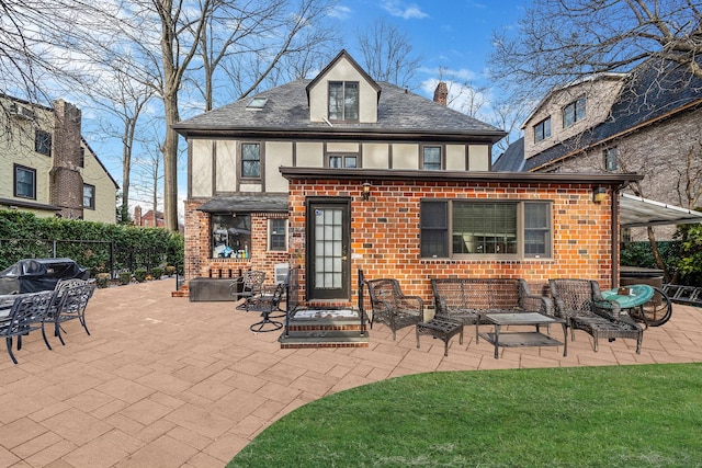 back of house featuring a patio