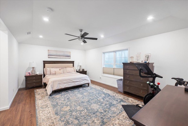 bedroom with ceiling fan and dark hardwood / wood-style flooring