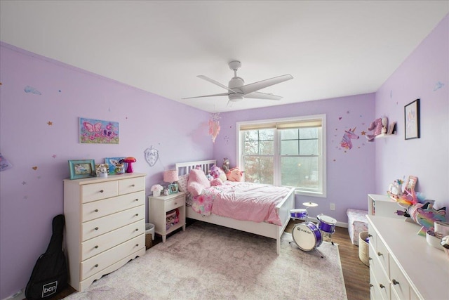 bedroom featuring ceiling fan and light wood-type flooring