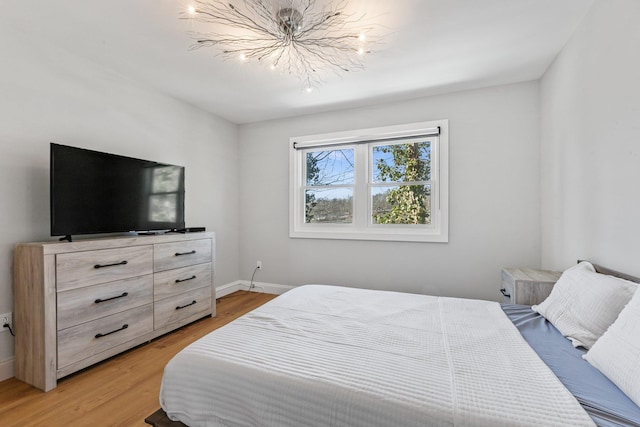 bedroom featuring wood-type flooring