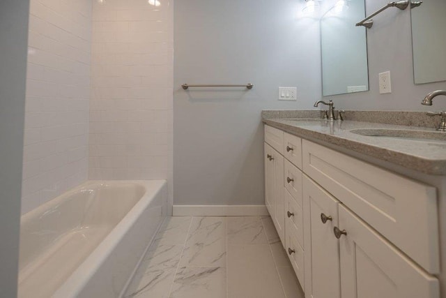 bathroom featuring vanity and shower / bath combination