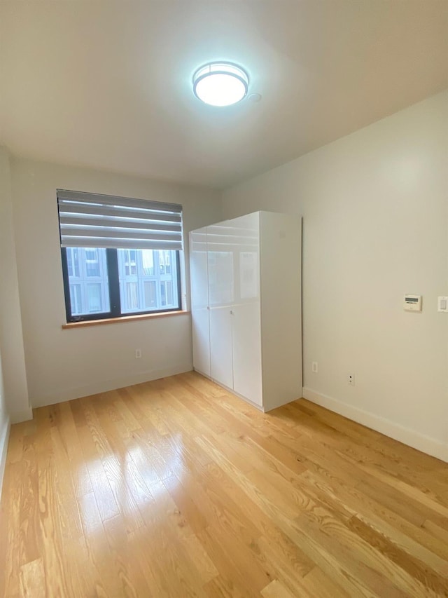 unfurnished bedroom with light hardwood / wood-style floors