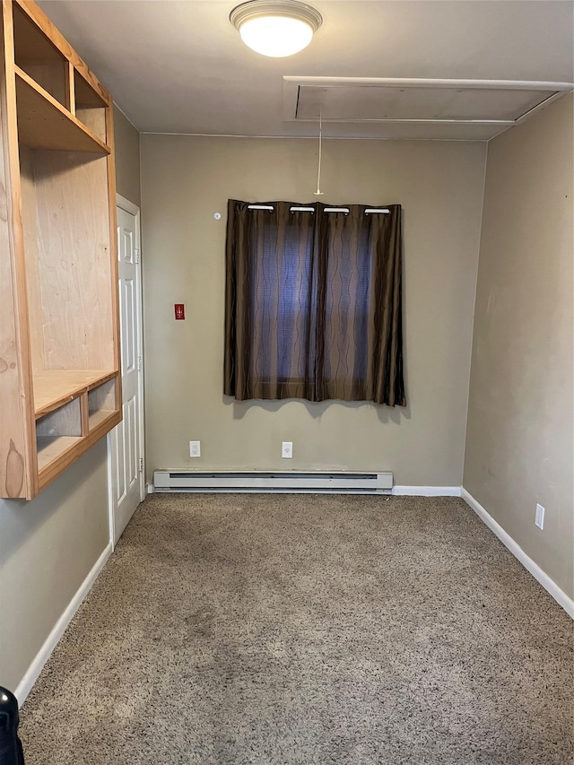 unfurnished room with baseboard heating