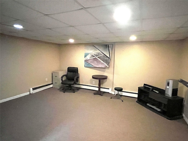 exercise area featuring carpet and a drop ceiling