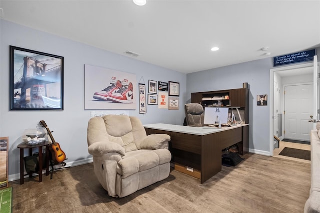 office area with wood-type flooring