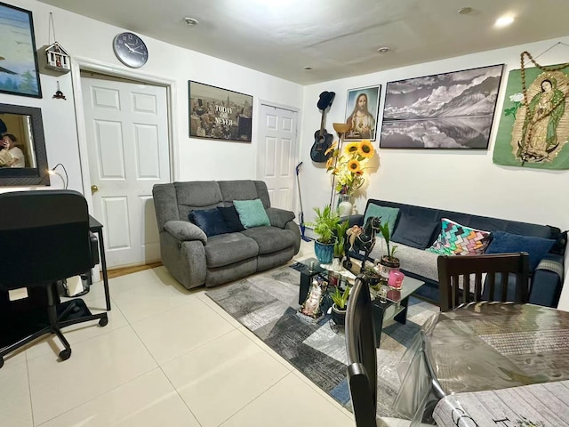 living room with light tile patterned flooring