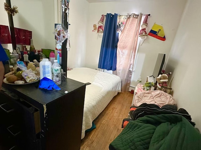 bedroom featuring light wood-type flooring