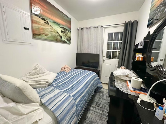 bedroom featuring electric panel