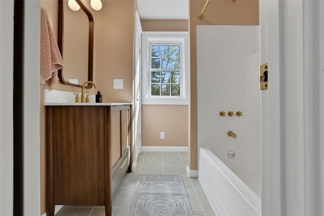 bathroom featuring tile patterned floors, vanity, and bathtub / shower combination