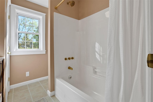 bathroom featuring tile patterned flooring and shower / bath combo with shower curtain