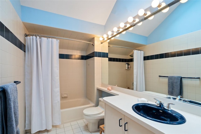 full bathroom with lofted ceiling, tile patterned floors, shower / bath combination with curtain, and toilet