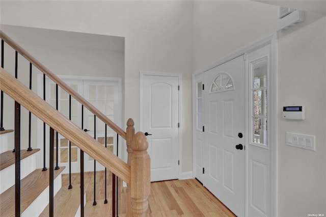 foyer with light hardwood / wood-style floors