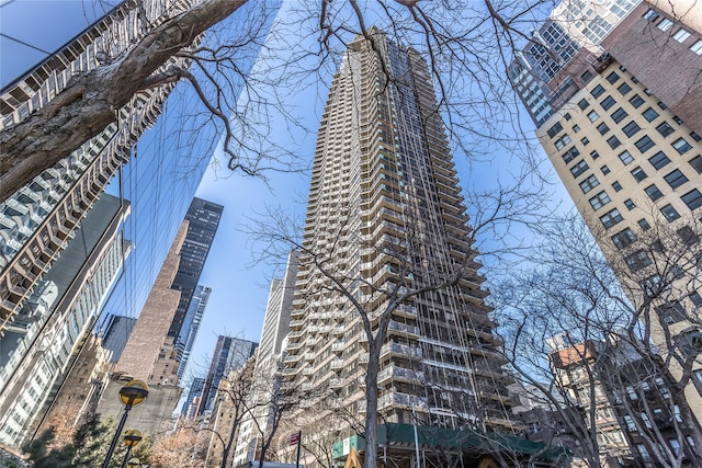 view of building exterior featuring a city view