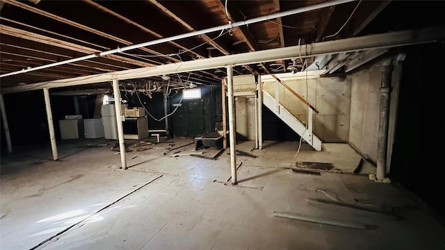 basement with white fridge