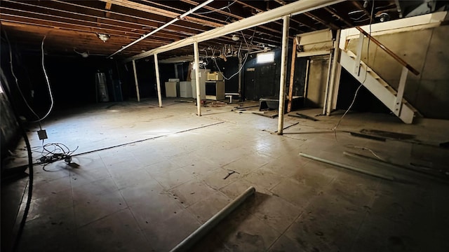 basement with washing machine and dryer