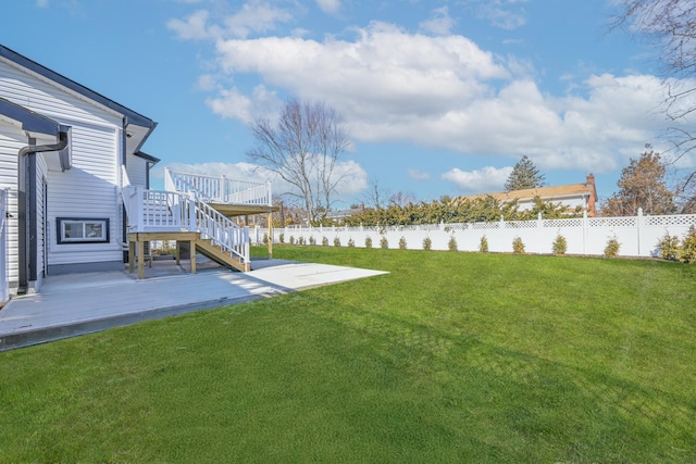 view of yard with a deck