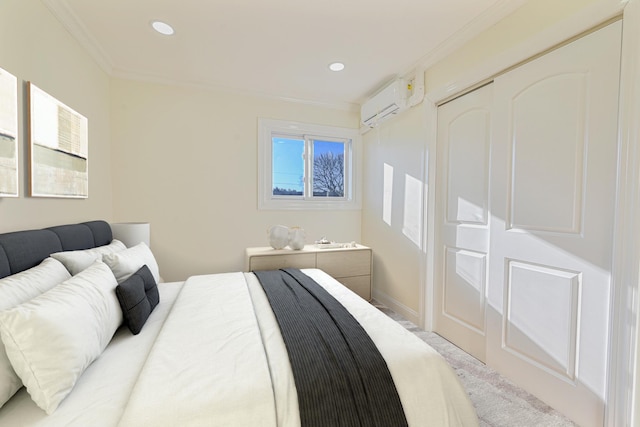 bedroom with ornamental molding and a wall unit AC