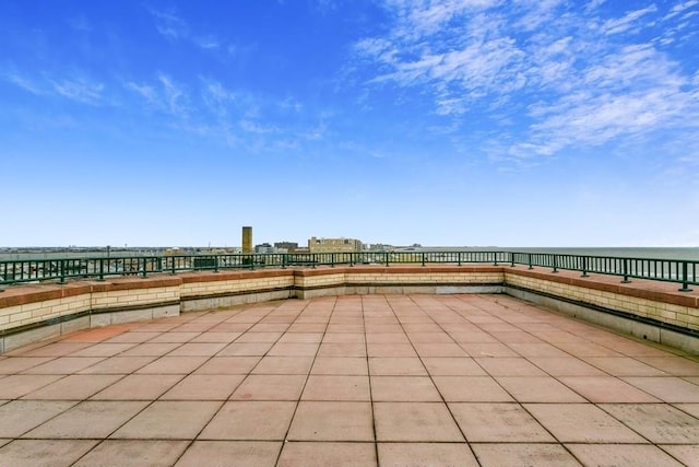 view of patio / terrace featuring a water view