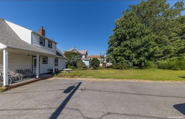 exterior space featuring a yard