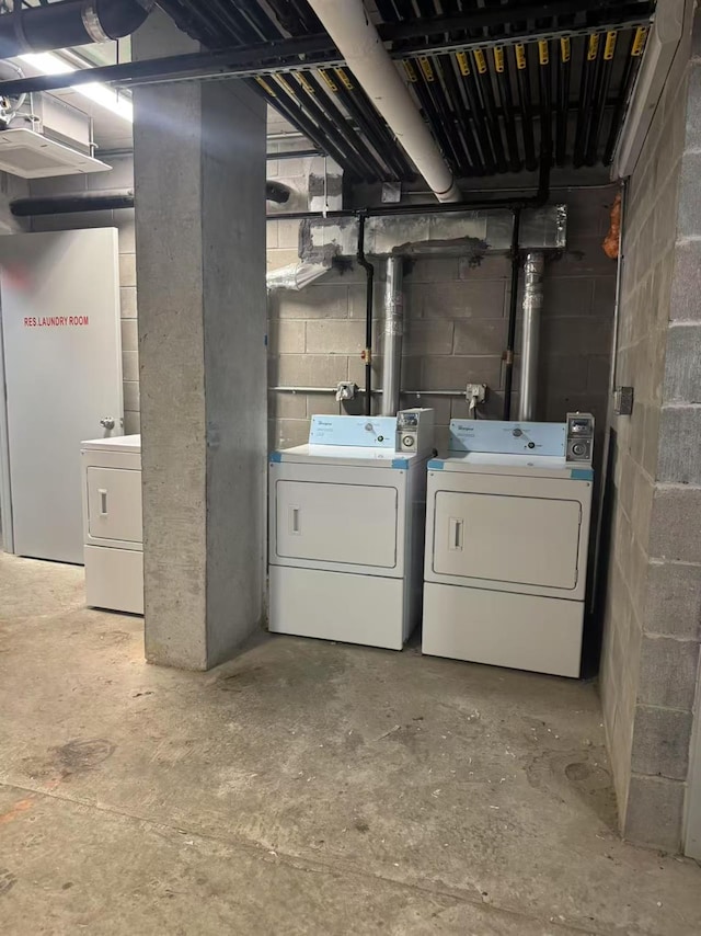 basement featuring washer and dryer