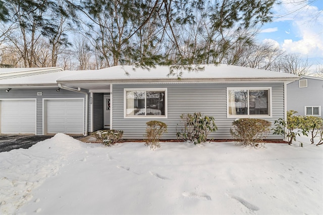 single story home with a garage