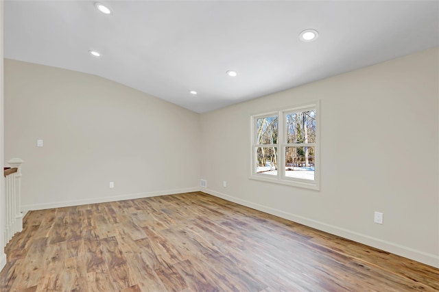 spare room with light hardwood / wood-style floors