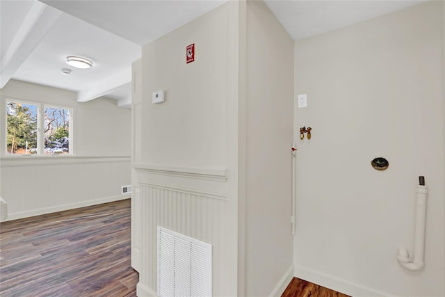 corridor featuring dark hardwood / wood-style floors