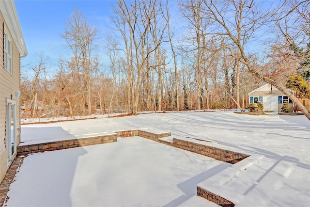 view of snowy yard