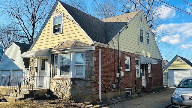 view of side of property featuring a garage