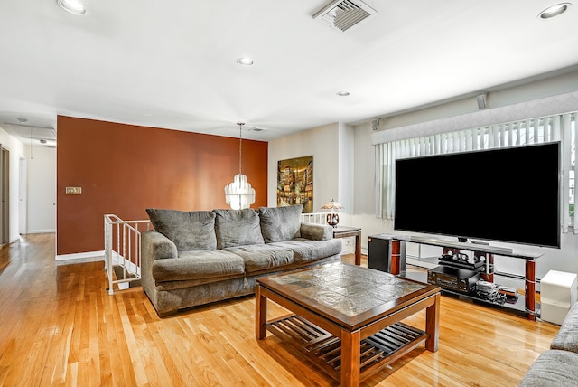 living room with light hardwood / wood-style floors