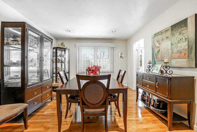 dining space featuring light hardwood / wood-style floors