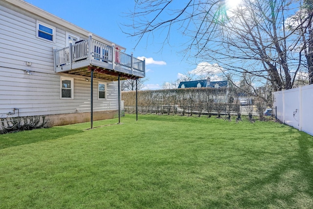 view of yard with a wooden deck