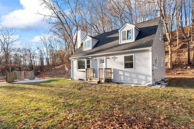 new england style home with a front yard