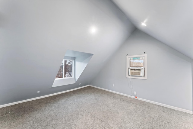 bonus room featuring lofted ceiling, cooling unit, carpet floors, and plenty of natural light