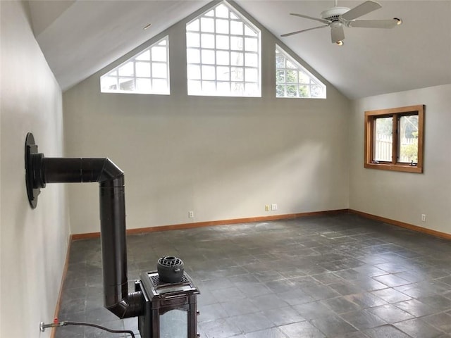 workout area featuring high vaulted ceiling and ceiling fan