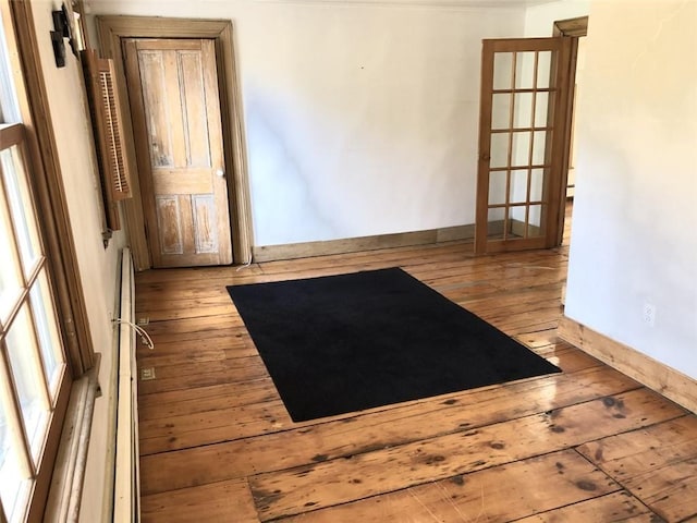 unfurnished room with light hardwood / wood-style floors