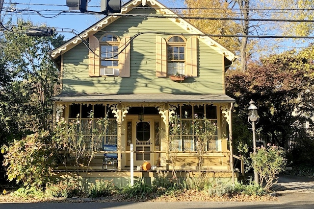 view of front of home featuring cooling unit