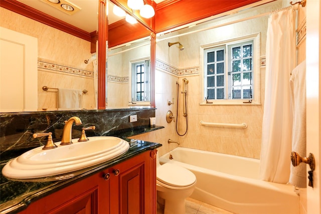 full bathroom with shower / tub combo with curtain, tasteful backsplash, tile walls, vanity, and toilet