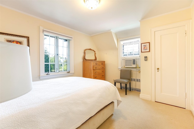 bedroom featuring multiple windows, crown molding, radiator, and light colored carpet