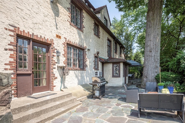 view of patio featuring a grill and outdoor lounge area