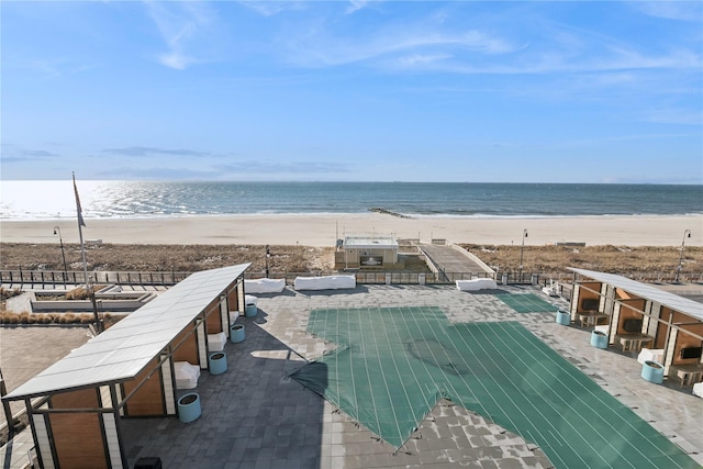 property view of water featuring a view of the beach