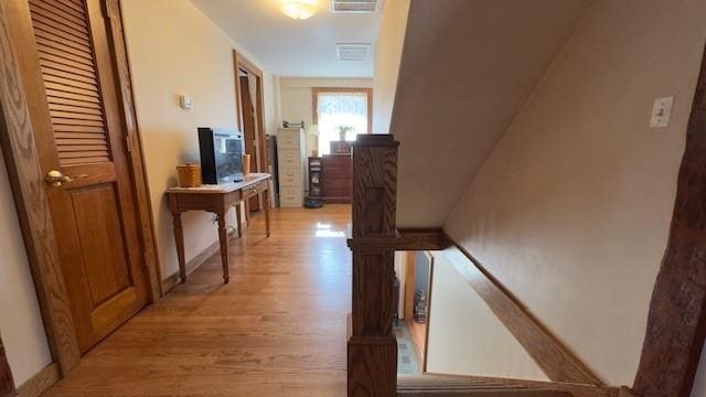 hall featuring light hardwood / wood-style floors