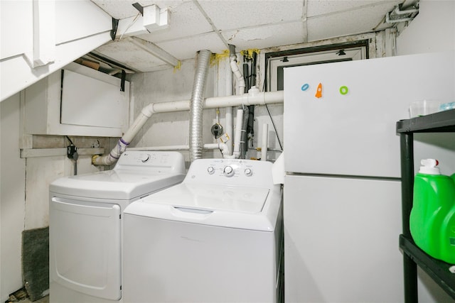 laundry area featuring washing machine and dryer