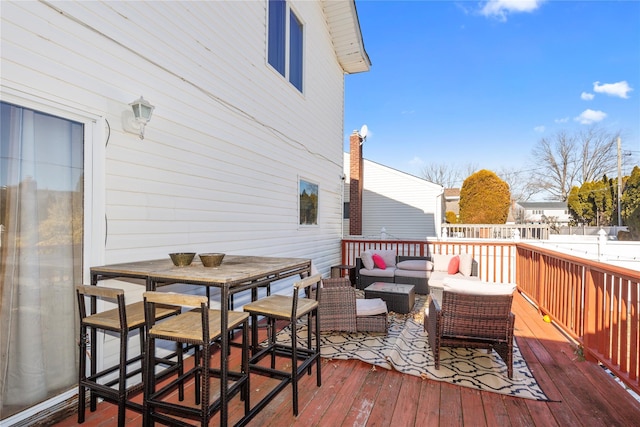 deck featuring an outdoor living space